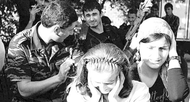 Traditional shooting at a Chechen wedding party, Grozny. Photo by www.flickr.com/photos/dziadek