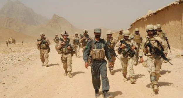 Georgian soldiers secure a village in the Helmand province, Afghanistan. 2010. http://en.wikipedia.org