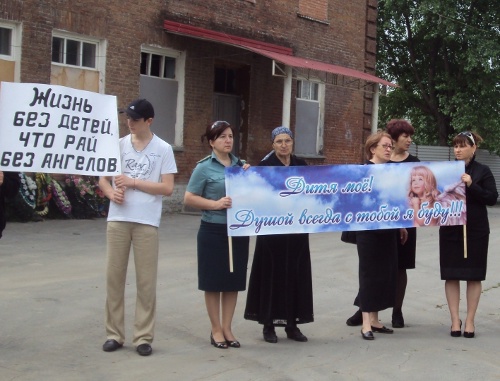 Rally "Take Care of Children", held on June 1, 2011, by Association of Terror Act Victims "Beslan Mothers" in the yard of Beslan School No. 1. Photo by the "Caucasian Knot"