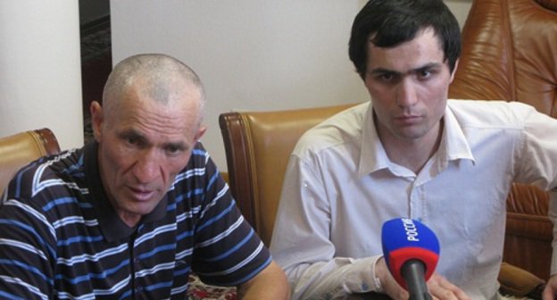 Seidula Kazanalipov and his father at the sitting of the Commission for adaptation. Makhachkala, July 19, 2011. Photo by Zakir Magomedov for "Caucasian Knot".