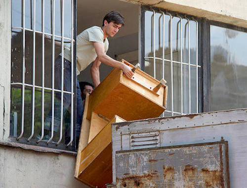 Refugees are evicted from the building of the "Samshoblo" Printing House in Tbilisi, July 2010. Photo by Alexander Imedashvili, NEWSGEORGIA