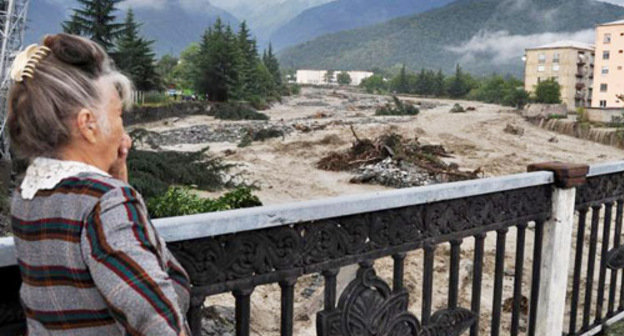 Local resident examines flood consequences in Lagodekhi, Kakheti Region, Georgia, August 2011. Photo: ick.ge