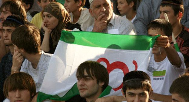 Fans in the stalls of Rashid Aushev Stadium during football match 'Angusht" (Nazran) and "Fayur" (Beslan), Ingushetia, Nazran, August 21, 2011. Photo by Alan Tskhurbaev: http://www.m.kavkaz-uzel.ru/blogs/posts/8817