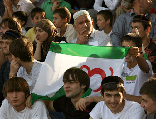 Fans in the stalls of Rashid Aushev Stadium during football match 'Angusht" (Nazran) and "Fayur" (Beslan), Ingushetia, Nazran, August 21, 2011. Photo by Alan Tskhurbaev: http://www.m.kavkaz-uzel.ru/blogs/posts/8817