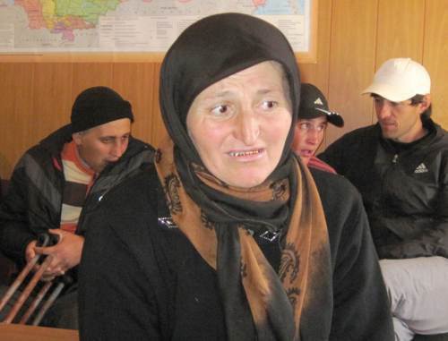 In the foreground: Uzlipat Magomedova, mother of Dalgat Yusupov, who received brain contusion after power agents' beating. In the background on the left: Magomed Isaev, who was also beaten by power agents, Dagestan, Tsuntin District, Khutrakh village, October 8, 2011. Photo provided by an eyewitness