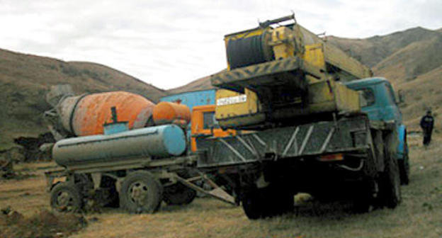 Construction machinery of the "Robshin" Company near the Trchkan Waterfall, Armenia, Lori Region, October 2011. Photo: hetq.am