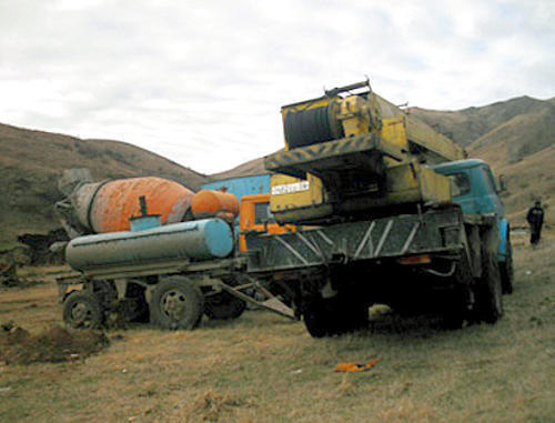 Construction machinery of the "Robshin" Company near the Trchkan Waterfall, Armenia, Lori Region, October 2011. Photo: hetq.am