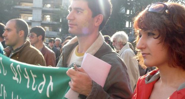 Protest action against construction of a minor hydroelectric power plant on the Trchkan Waterfall in front of the Ministry of Nature Protection of Armenia. The poster reads: "Trchkan Waterfall has not a drop of excess water", Yerevan, November 1, 2011. Photo by Armine Martirosyan for the "Caucasian Knot"