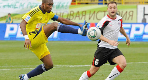 Samuel Eto'o (left), a forward of the "Anji" Football Club during a match with the "Amkar" FC, Dagestan, Makhachkala, October 29, 2011. Courtesy of the press service of the "Anji" FC, www.fc-anji.ru