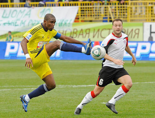 Samuel Eto'o (left), a forward of the "Anji" Football Club during a match with the "Amkar" FC, Dagestan, Makhachkala, October 29, 2011. Courtesy of the press service of the "Anji" FC, www.fc-anji.ru