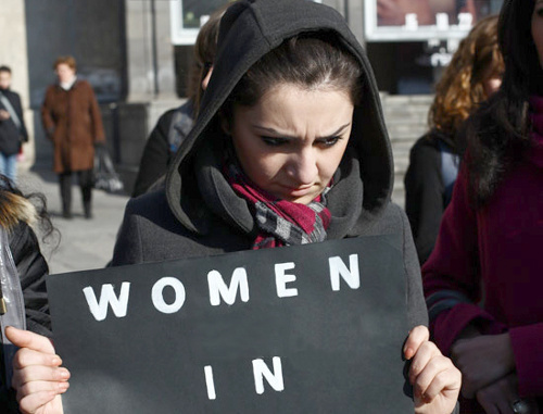 Participant of the action against gender violence "Women in Black", Yerevan, December 3, 2011. Photo by Varo Rafaelyan, www.panarmenian.net

 