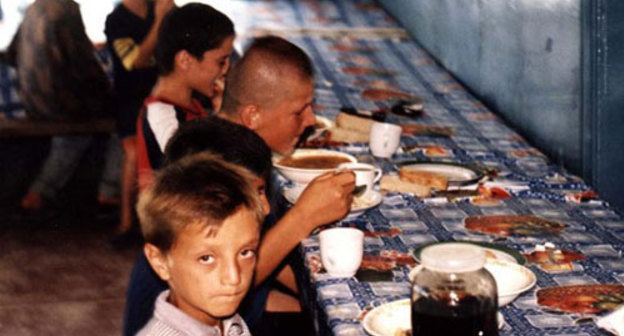 A boy in a canteen of a compact residence centre in Chechnya, Said Magomedov specially for the "Caucasian Knot"