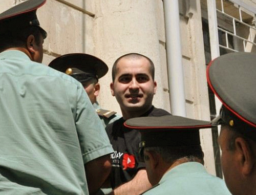 Arrested activist Bakhtiyar Gadjiev (centre), Baku, April 20, 2011. Courtesy of irfs.az