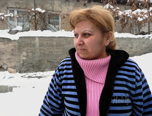 Shushanik Margaryan, a resident of Yerevan district of Sari Tag, tells about her house hit by a landslide. Armenia, Yerevan, February 17, 2012. Photo by Armine Martirosyan for the "Caucasian Knot"