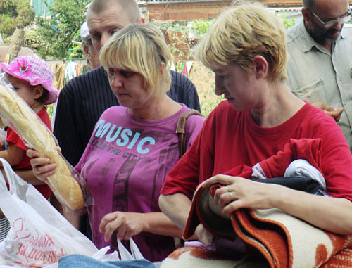 Residents of Krymsk-flood victims receive humanitarian aid, Krasnodar Territory, Krymsk, July 8, 2012. Photo by Natalia Dorokhina for the "Caucasian Knot"