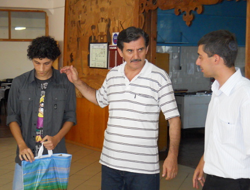 Right to left: Makhmud Karataban, Allyatin Bairam and a guest from Turkey; Adygea, Maikop, August 12, 2012. Photo by Oleg Chaly for the "Caucasian Knot"