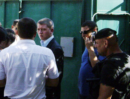 Court marshals and Mayoralty officials visiting the Mzokov family; Sochi, 17 Jan Fabricius Street; September 18, 2012. Photo by Svetlana Mzokova