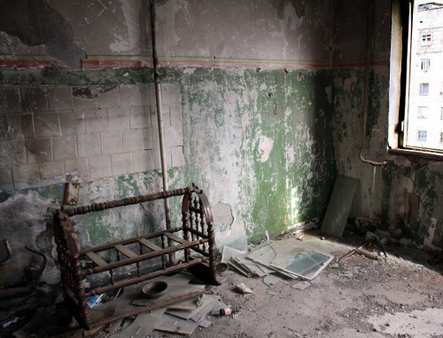 One of the damaged flats on the 7th floor of the house destroyed during the warfare in August 2008. South Ossetia, Tskhinvali, December 2, 2013. Photo by Mariya Kotaeva for the "Caucasian Knot"