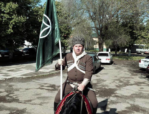 Participant of the horse march dedicated to the 57th anniversary of the return of deported Karachay people to their historic homeland. Karachay-Cherkessia, the Kuban Region, village Znamenka, May 3, 2014. Photo by Kemal Urusov and Artur Baychorov for the "Caucasian Knot: