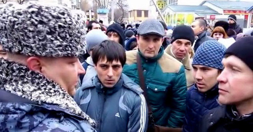 The participants of a people's assembly demanded from the authorities to fairly investigate the murder of a soldier. Minvody, January 24, 2015. Screenshot of a video by the user Roman Novikov http://www.youtube.com/watch?v=80uWjsfv-xk