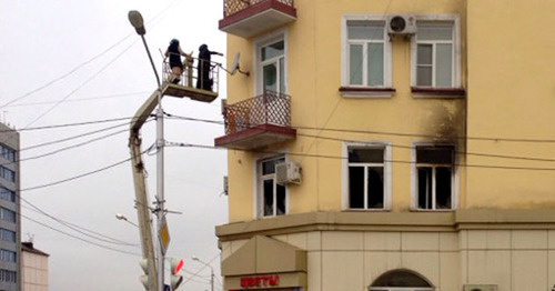 The fire in the flat where the office of the Joint Mobile Group (JMG) is located. Grozny, December 15, 2014. Photo by Akhmed Aldebirov for the "Caucasian Knot"