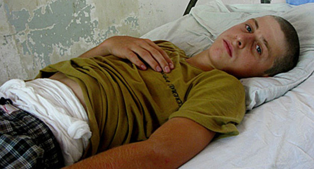 Makhmud Ahmedov, beaten by militiamen, in a Makhachkala hospital, July 27, 2010. Photo by Zakir Magomedov