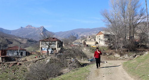 Zinaida Grigoryan visits the grave of her son killed in the April war in 2016. Aykavan village of Hadrut region of Nagorno-Karabakh. January 8, 2017. Photo by Alvard Grigoryan for the "Caucasian Knot"