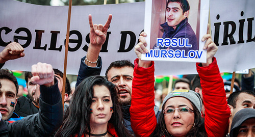 Rally participants hold portrait of political prisoner, Baku, March 2015. Photo by Aziz Karimov for the ‘Caucasian Knot’. 