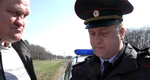 Detention of Oleg Petrov. Screenshot: http://review-watch.ru/video/UWK1p5DS7UE