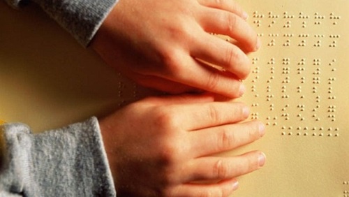 Reading Braille. Photo: http://jurliga.ligazakon.ua/news/2017/5/18/159902.htm