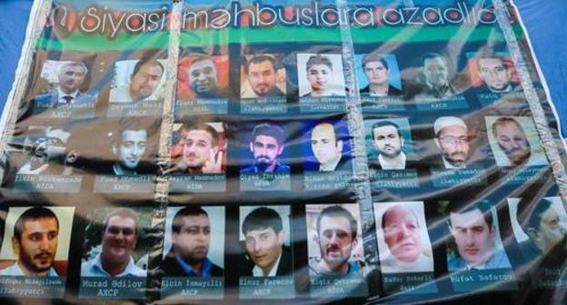 A poster with the photos of the political prisoners in Azerbaijan, used at the opposition rally in Baku on April 8, 2017. Photo by Aziz Karimov for "Caucasian Knot"