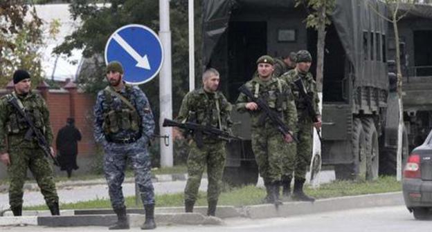 Law enforcers. Photo: REUTERS/Alkhan Gargayev