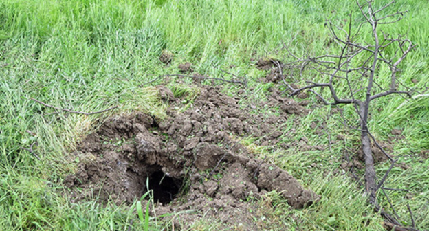 Shell explosion hole, Nagorno-Karabakh. Photo by Alvard Grigoryan for the Caucasian Knot. 