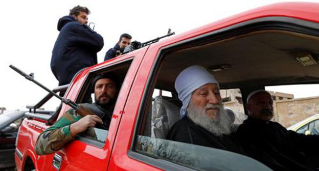 Armed people in Syria. Photo REUTERS OMAR SANADIKI