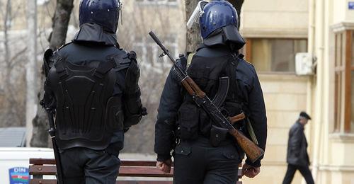 Law enforcers. Photo: REUTERS/David Mdzinarishvili