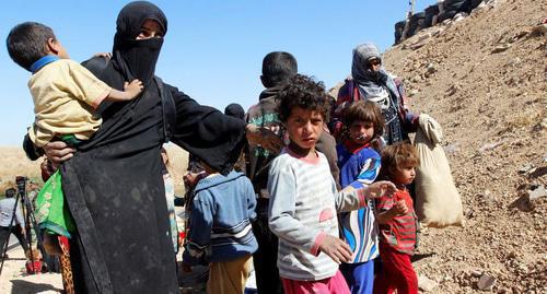 A woman with children in southwestern Kirkuk. Iraq, October 4, 2017. Photo:  REUTERS/АКО Rashid