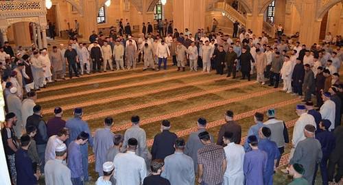 Followers of Sheikh Kunta-Haji Kishiev in a mosque. Photo by the press service of the Spiritual Administration of Muslims of Chechnya http://www.dumchr.ru/single-post/2015/07/14/%D0%92-%D0%A7%D0%B5%D1%87%D0%BD%D0%B5-%D0%BE%D1%82%D0%BC%D0%B5%D1%82%D0%B8%D0%BB%D0%B8-%D0%B4%D0%B5%D0%BD%D1%8C-%D1%80%D0%BE%D0%B6%D0%B4%D0%B5%D0%BD%D0%B8%D1%8F-%D1%88%D0%B5%D0%B9%D1%85%D0%B0-%D0%9A%D1%83%D0%BD%D1%82%D1%8B%D0%A5%D0%B0%D0%B4%D0%B6%D0%B8-%D0%9A%D0%B8%D1%88%D0%B8%D0%B5%D0%B2%D0%B0"