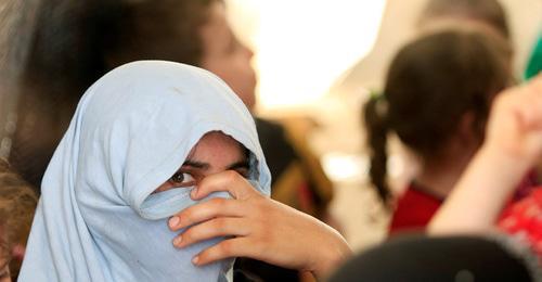 Muslim woman. Photo: REUTERS/Alaa Al-Marjani