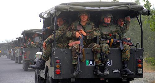 Column of Georgian soldiers near Tskhinvali, August 8, 2008. Photo: REUTERS/Irakli Gedenedze