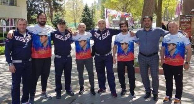 Members of the Georgian national freestyle wrestling team wearing Russian Tri-color T-shirts. Photo: RFE/RL