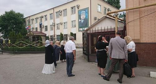 People at the Shali City Court in Chechnya. Photo is provided by the press service of HRC 'Memorial'