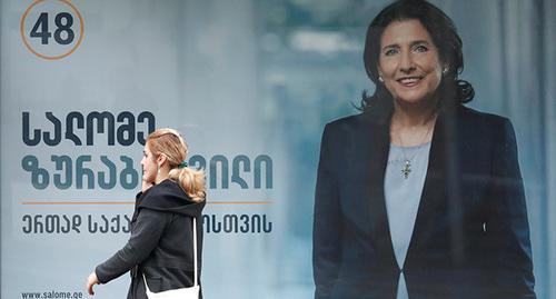 Election campaign poster with Salome Zurabishvili's portrait in Tbilisi, October 2018. Photo:  REUTERS/David Mdzinarishvili