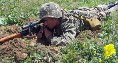 Serviceman at firing position. Photo: press service of the Ministry of Defence of Armenia, http://www.mil.am/ru/news/6276