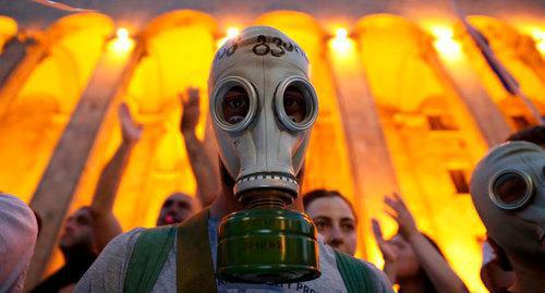 Participant of a protest rally in Tbilisi, June 22, 2019. Photo: REUTERS/Irakli Gedenidze images of the DAY