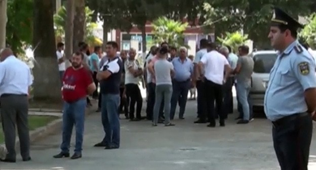 After shooting at a market in the village of Beyuk Kesik. Screenshot from video broadcasting by ‘Mir 24’, http://yandex.ru/efir?from=efir&stream_id45ae5759ad418da29eba6741d1319fb1