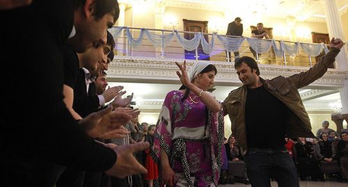 Guests dancing at the Chechen wedding party. Grozny, April 2013. Photo: REUTERS/Maxim Shemetov