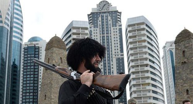 Man wearing national Chechen clothes. Photo: REUTERS/Said Tsarnayev