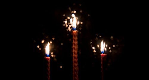 Ceremonial candles. Photo by Nina Tumanova for the "Caucasian Knot"