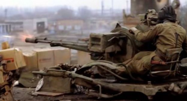 Hostilities in Grozny. Screenshot of the video "It was hell on earth: memories on the first Chechen war" by Radio Svoboda channel https://www.youtube.com/watch?v=BHjbaZIEosY