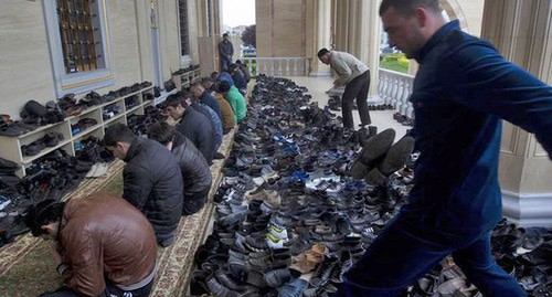 Believers in a mosque in Grozny. Photo: REUTERS/Maxim Shemetov